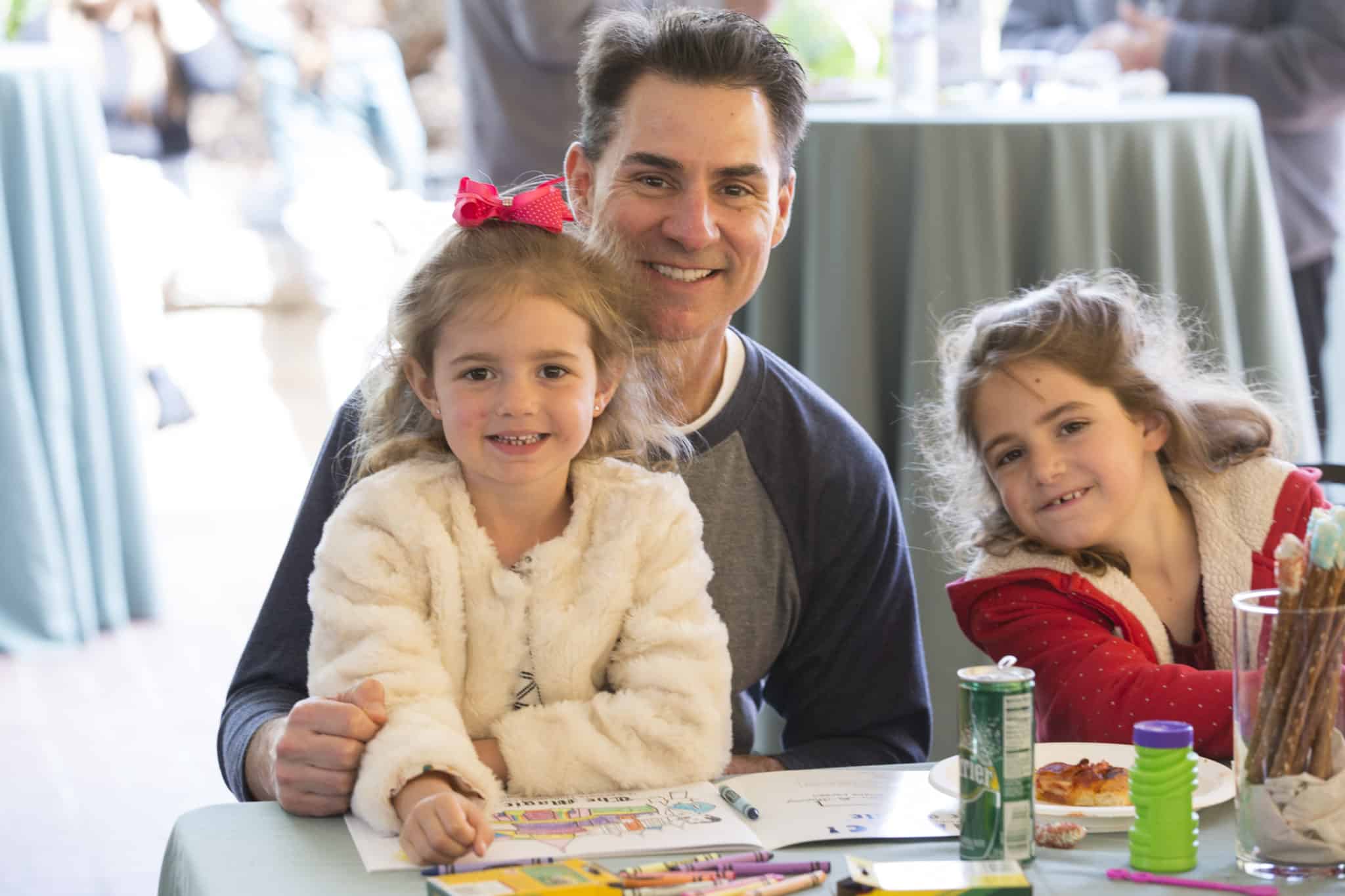 Dad and two daughters at It's Magic! at the Lobero Theatre