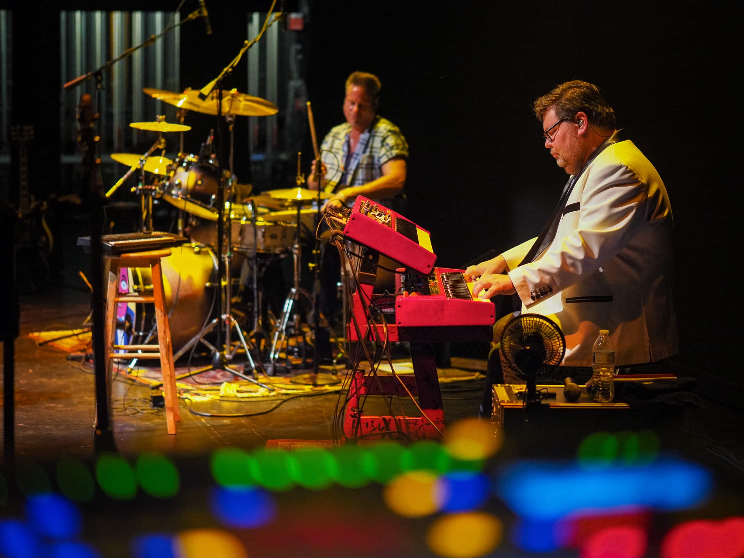 Musicians on stage playing at the Lobero Theatre