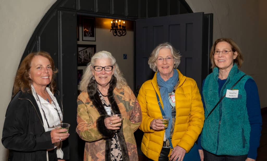 Four Lobero Theatre ushers at a party