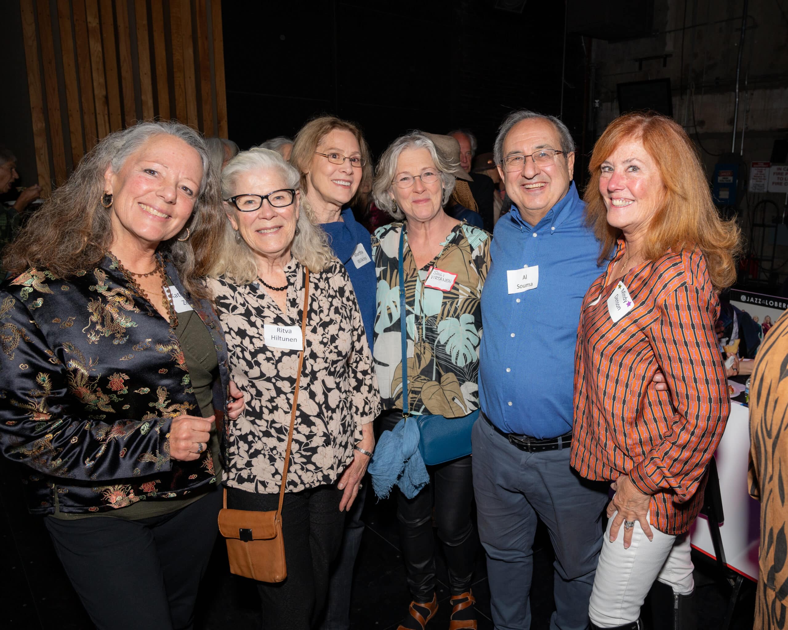 Six Lobero Theatre ushers at a party